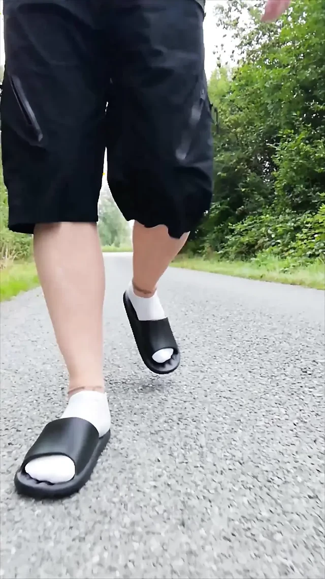 In Slippers and White Socks in Nature