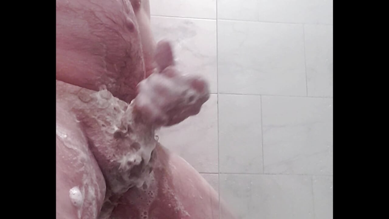 showering, masturbating, ejaculating, licking, swallowing