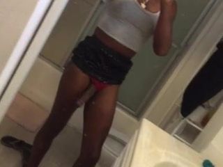 Selfie black shemale waving her almost erected cock