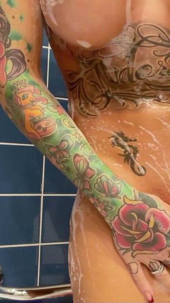 Captivating moment from "German Amateur Teen Anni Angel - Shower pussy shaving with close-up"