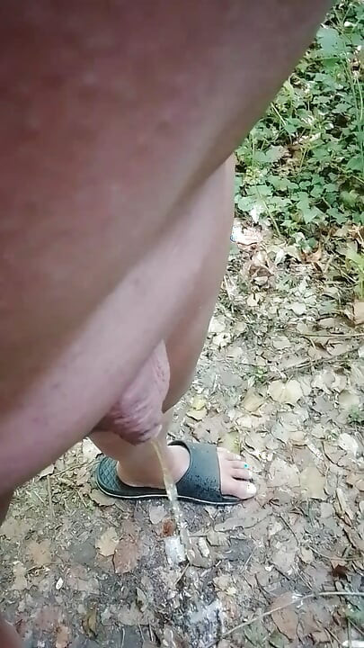 Naked in the forest and piss