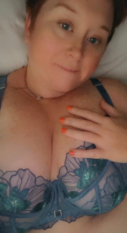 Playing with my big titties through my blue bra