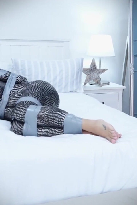 Terri - catburglar in tape bondage