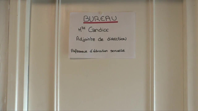 In the classroom, a knowledgeable educator provides an intimate instruction on the anus