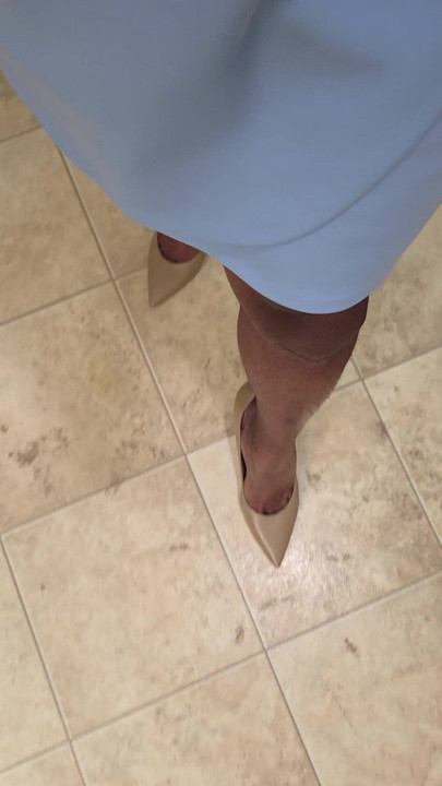 Walking with my light blue dress and high heels