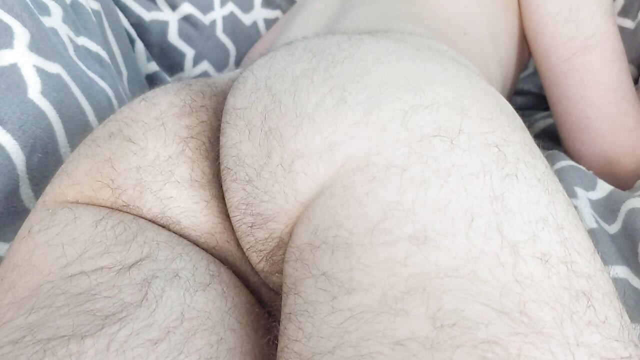 Boy's feet rubbing his big dripping cock
