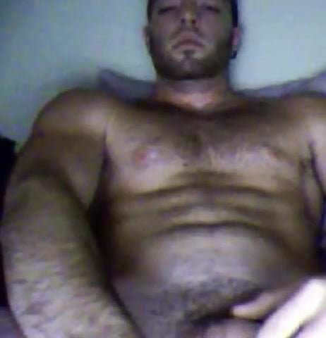 Sexy bearded cub stroking