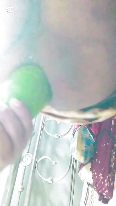 A gay boy fuck her ass hole by bige size vegitable.