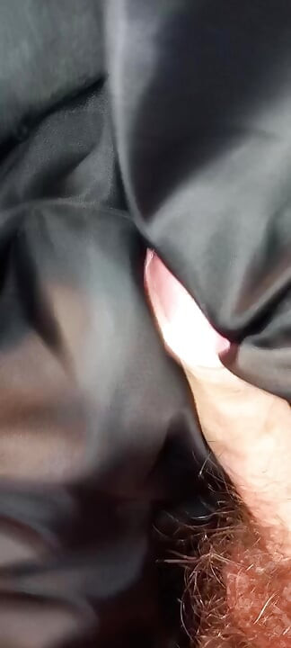 Masturbating on the lining of her black puffercoat