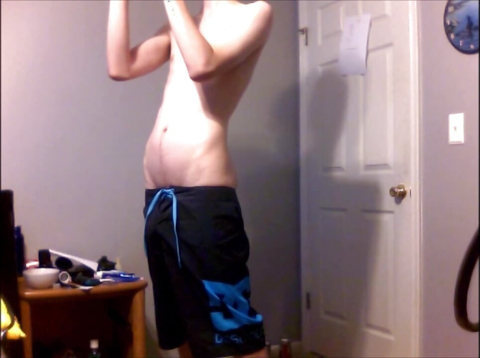 Young Guy Fills His Stomach with Water