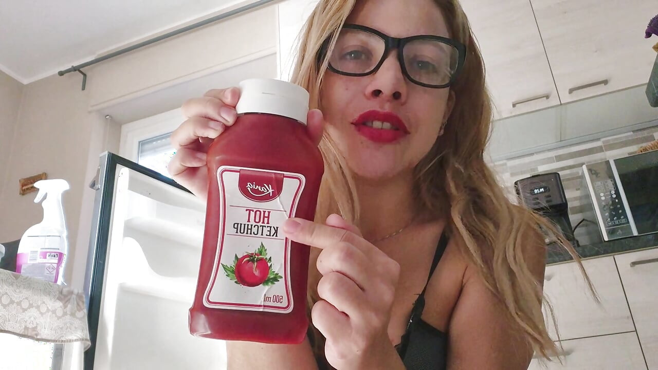 A hot blonde without tatoo likes cooking for you in lingerie and naked