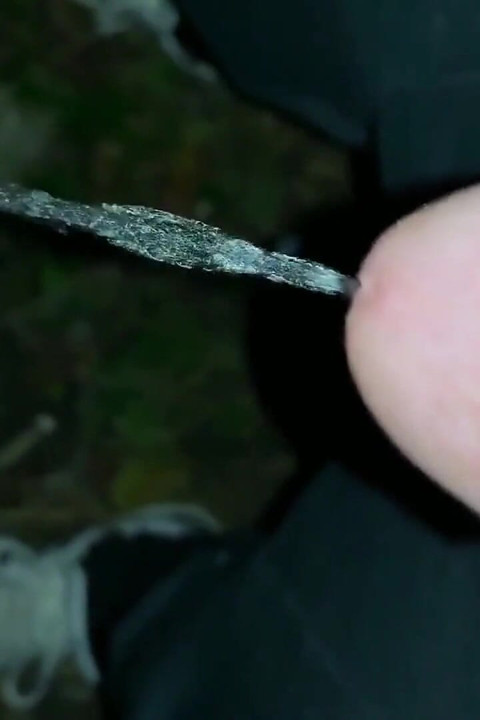 Slowmotion and Close up. Unwashed Uncut Cock Piss on the Ground Outdoor. Long Piss Stream
