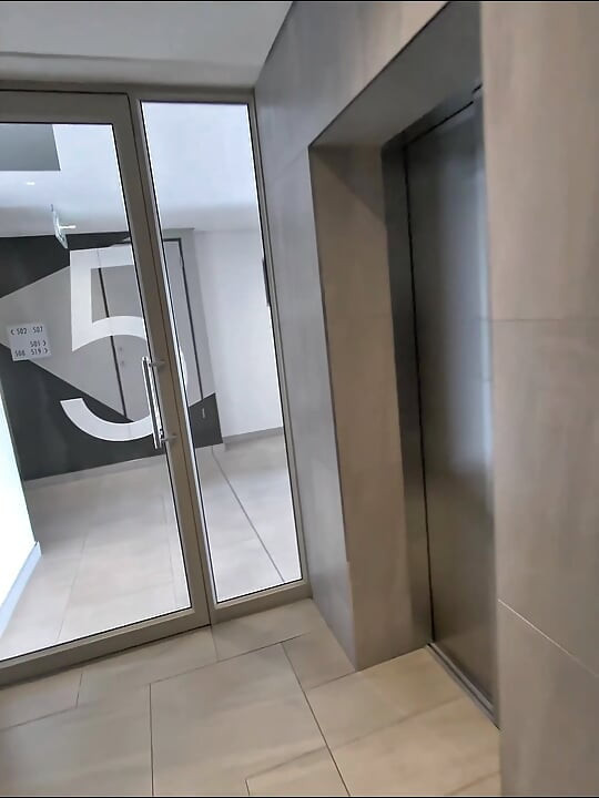 Shy Girl Gets Convinced in Elevator to Swallow a Stranger's Cum