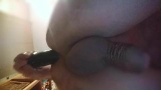 Anal play with a black toy