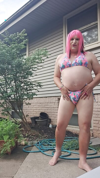 Feeling horny in my new bathing suit outside on the patio!