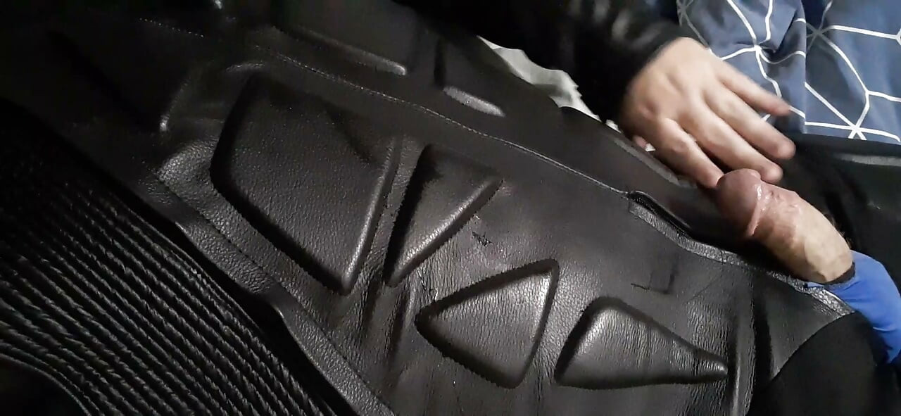 Biker cums in leather moto race suit