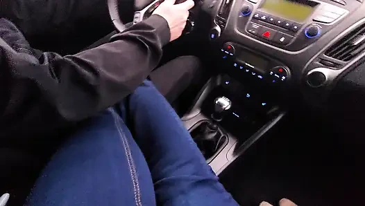 Amateur MILF in jeans and nylon socks gives a taxi driver a footjob