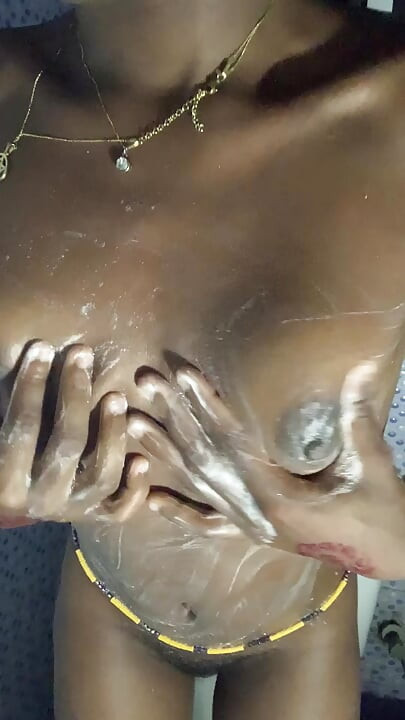 HOT ebony teen enjoys touching her boobs