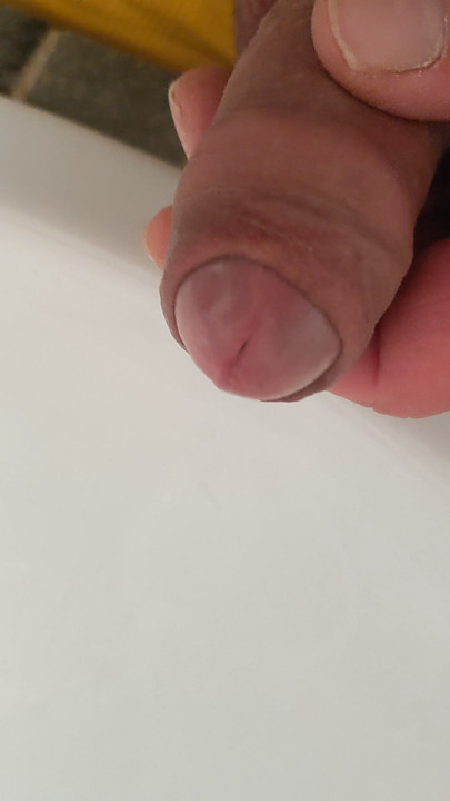 He pees in the sink of the public toilet