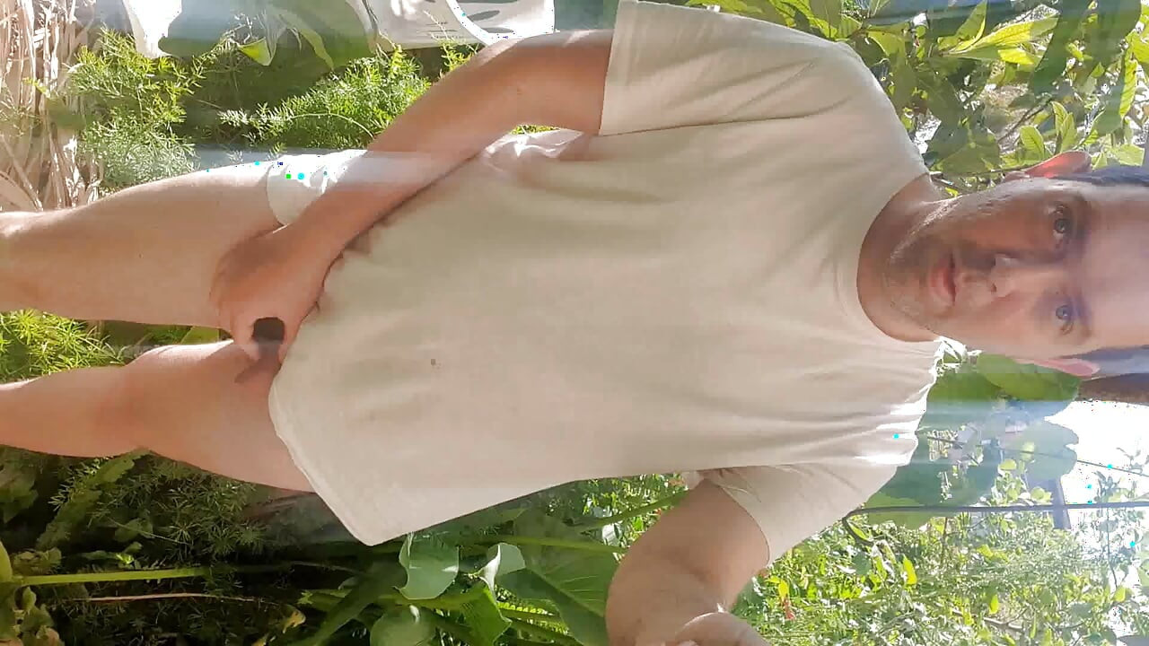 Being completely naked in the garden