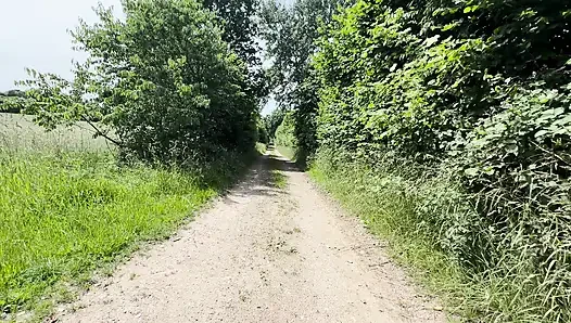 Boy naked on public dirt road