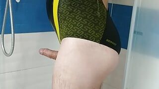 Boy in sexy Speedo one piece swimsuit get shower