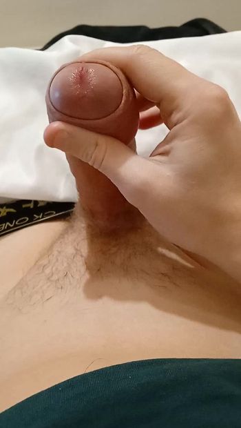 Guy jerking off uncircumcised cock on the table  #11