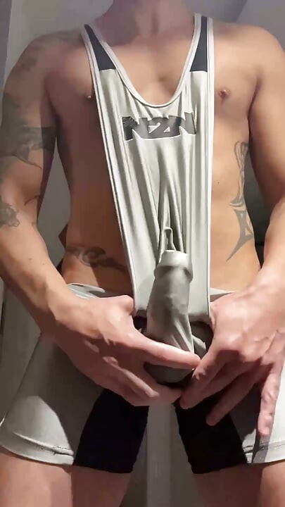 Muscle jock in lycra with huge cock thrusting until he cums