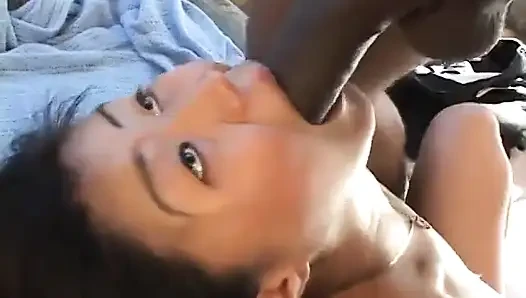 Horny Asian whore gives a messy blow job