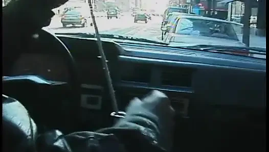Commuter redhead carpools with creep who debases her in car in city traffic