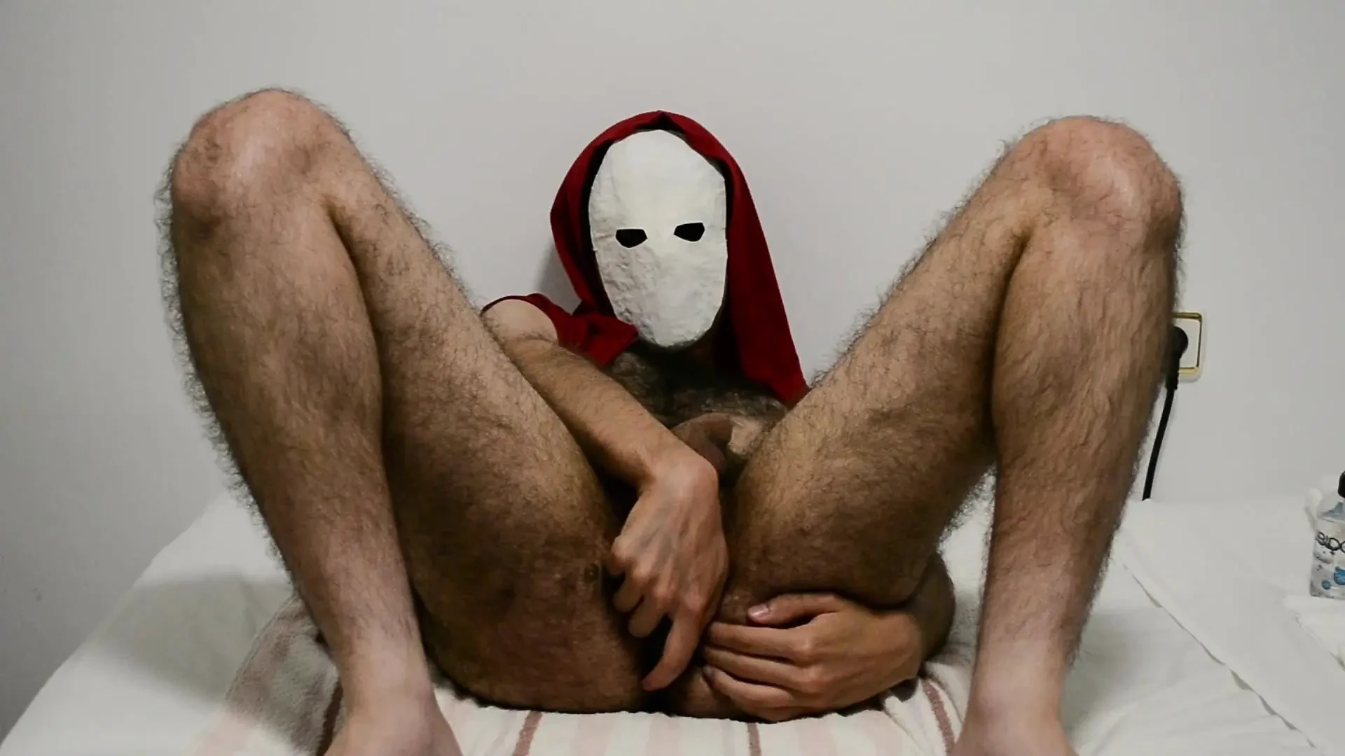 Masked guy uses his prostate massager