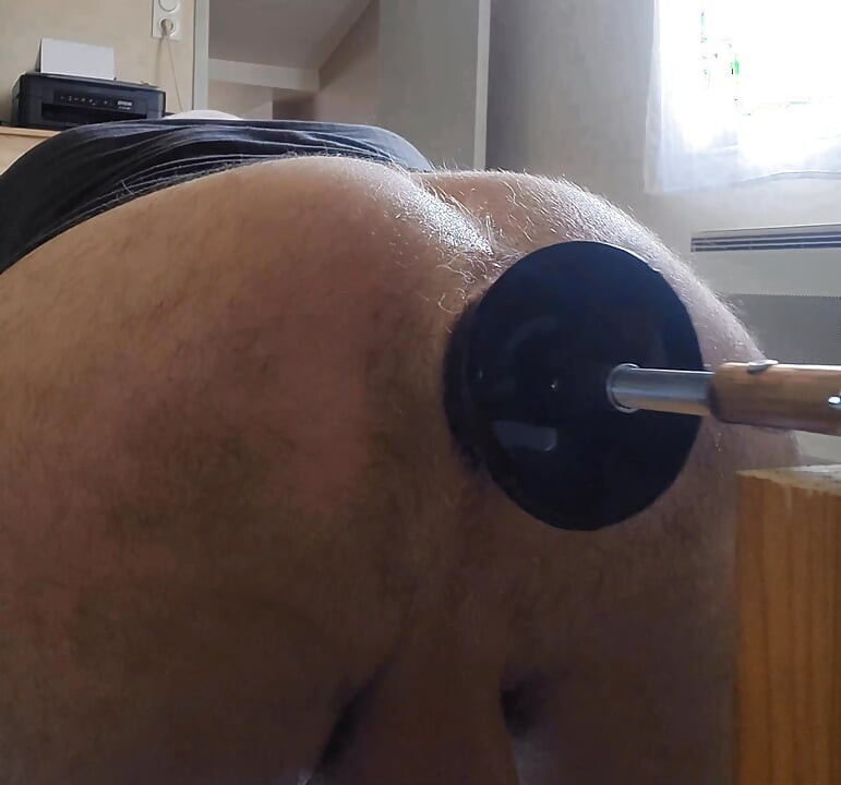 Fucking machine and big black dildo