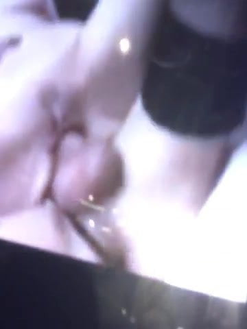 Masturbating