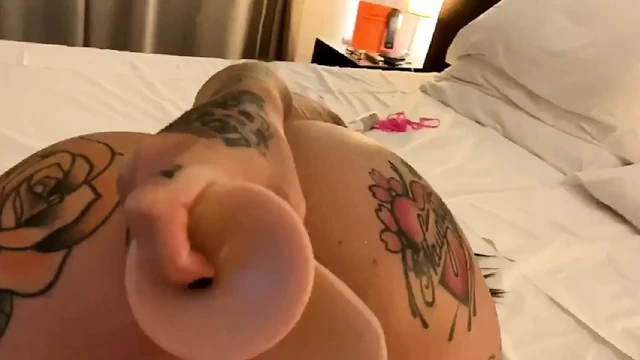 tattoed girlfriend fuck dildo in her ass in hotel room