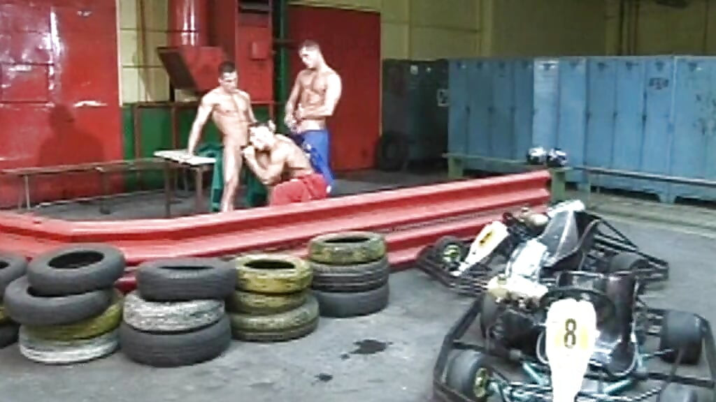Two Hung Muscle Studs Pound a Young Jock Anal in a Wild