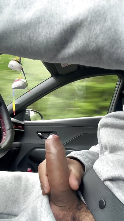 Horny jerk off in the car while driving