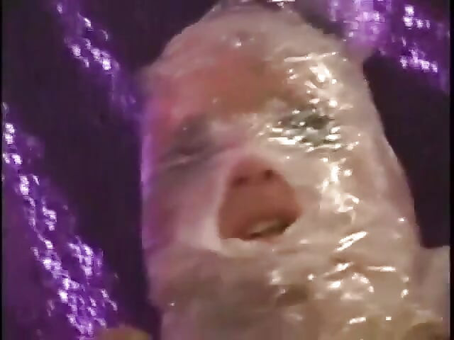 Dominated latex chick gets a hard bang from her dude