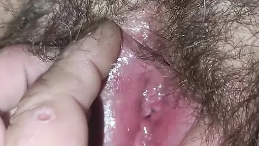 My wife's hairy wet cunt close-up