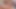 痩せた女の子が自分のアソコを指で愛撫し、その後ディルドで深く突く