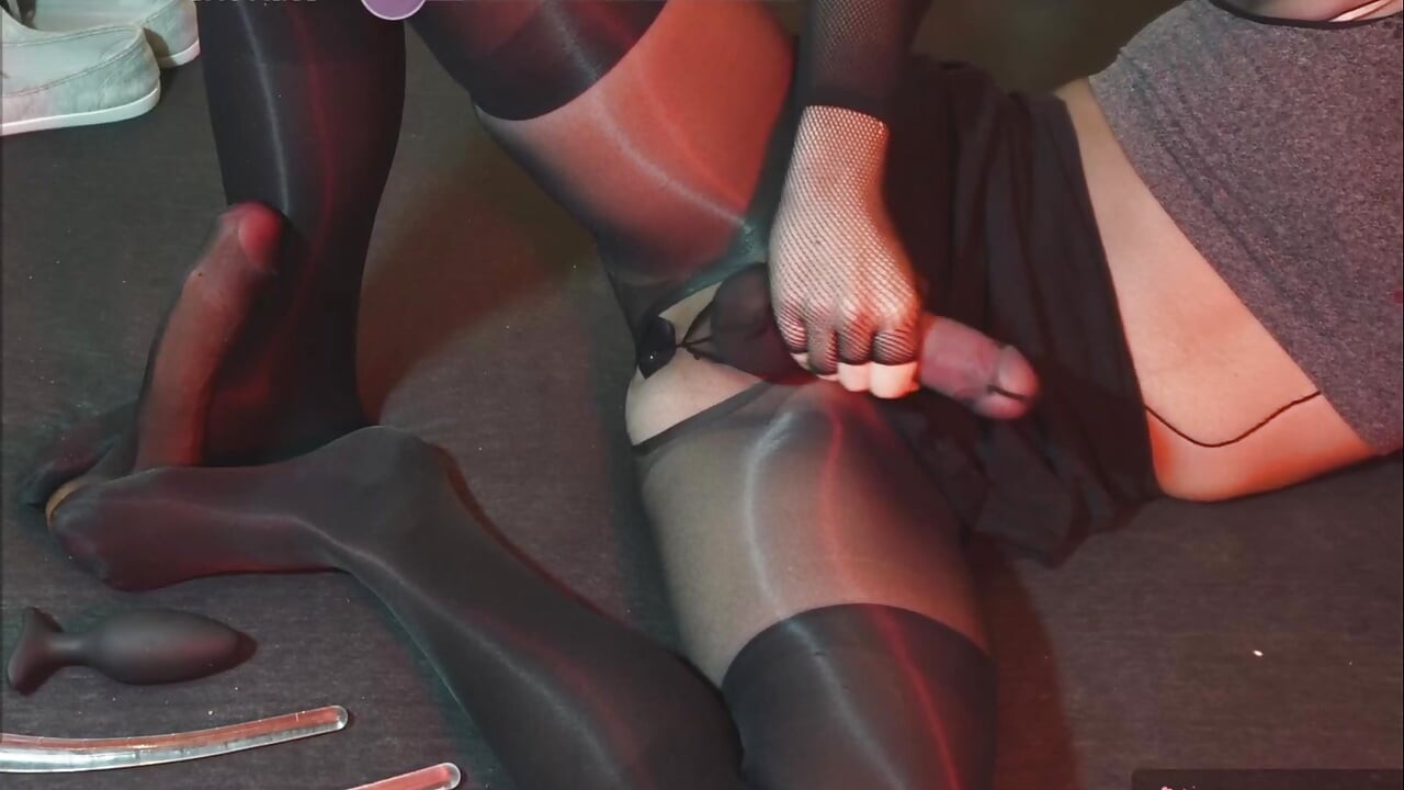 Fully body covered in layered nylon pantyhose with tight metal ring encased balls
