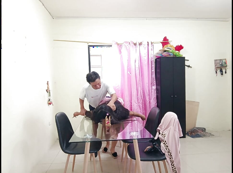 Stepfather and busty, big-assed stepdaughter fuck on the table.