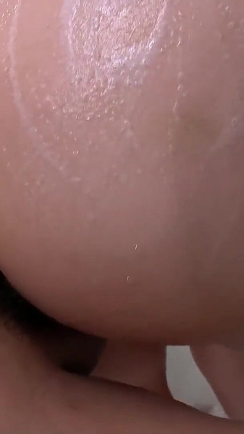 Key moment from "Japanese Mom tricked Virgin Boy to First Time Sex with Soap Shower before Cum in her"