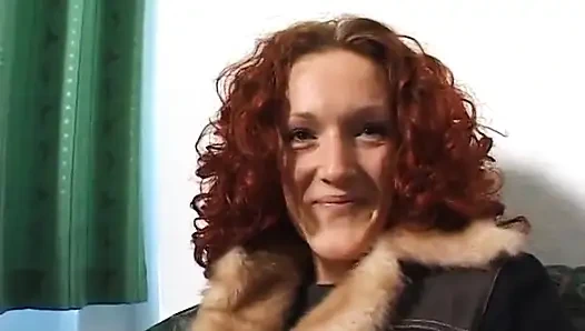 Cute redhead fingering her love hole