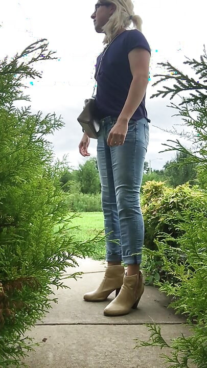 Crossdresser getting wet outside