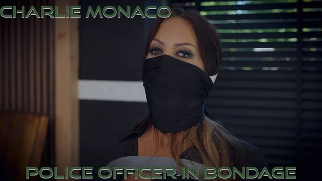 Charlie - Police Officer Put in Tape Bondage Bound and Gagged (GagAttack.NL)