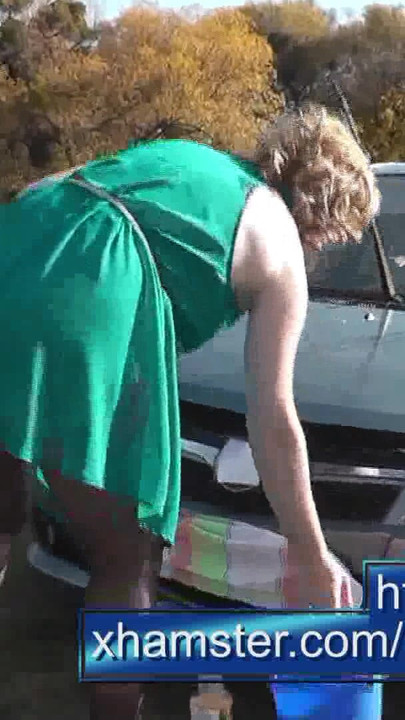 Spectacular moment from "Milf beautiful sexy blonde outdoors on river bank washes car without panties and bra under dress."