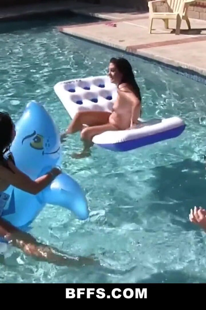 Lovely teen friends enjoying their curves in the pool