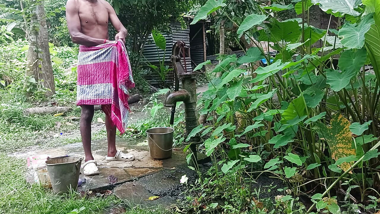 Tha naked Indian mature man shower in open place and showing body and dick..