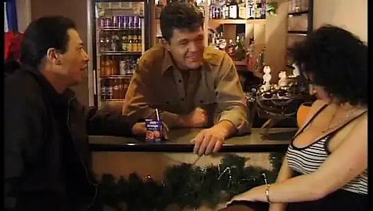 Brunette milf in a bar banged in a double penetration by the waiter and a customer