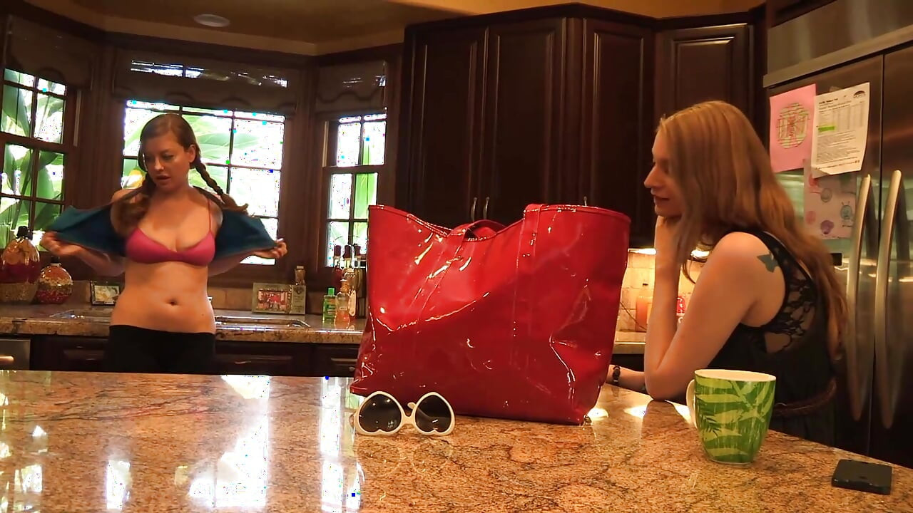 Lesbians in action with some sex toys